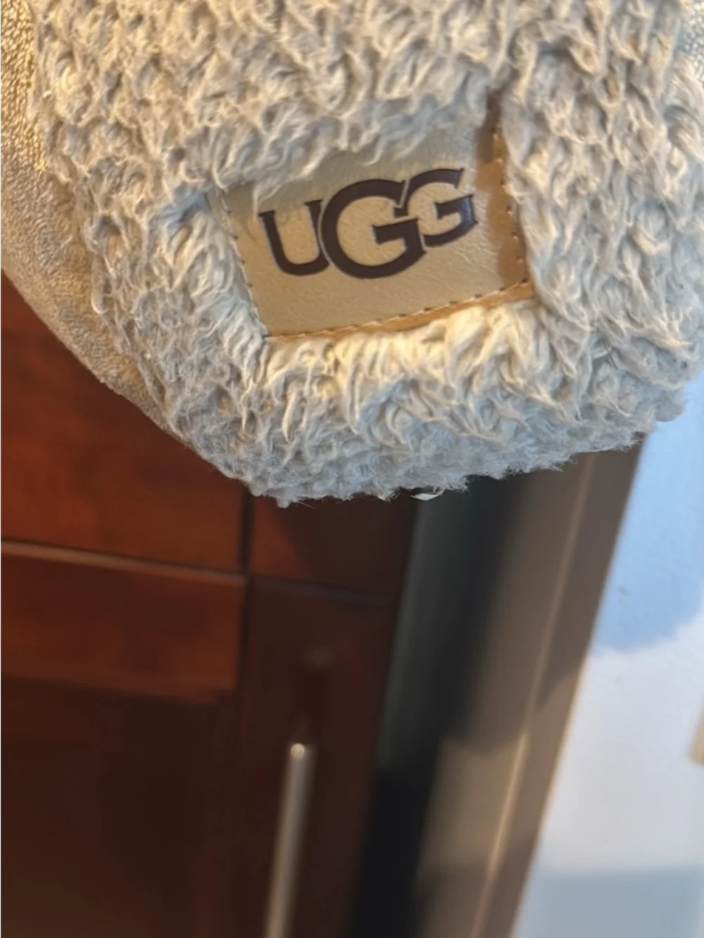 UGG Cream Plush Bedrest Pillow triangle